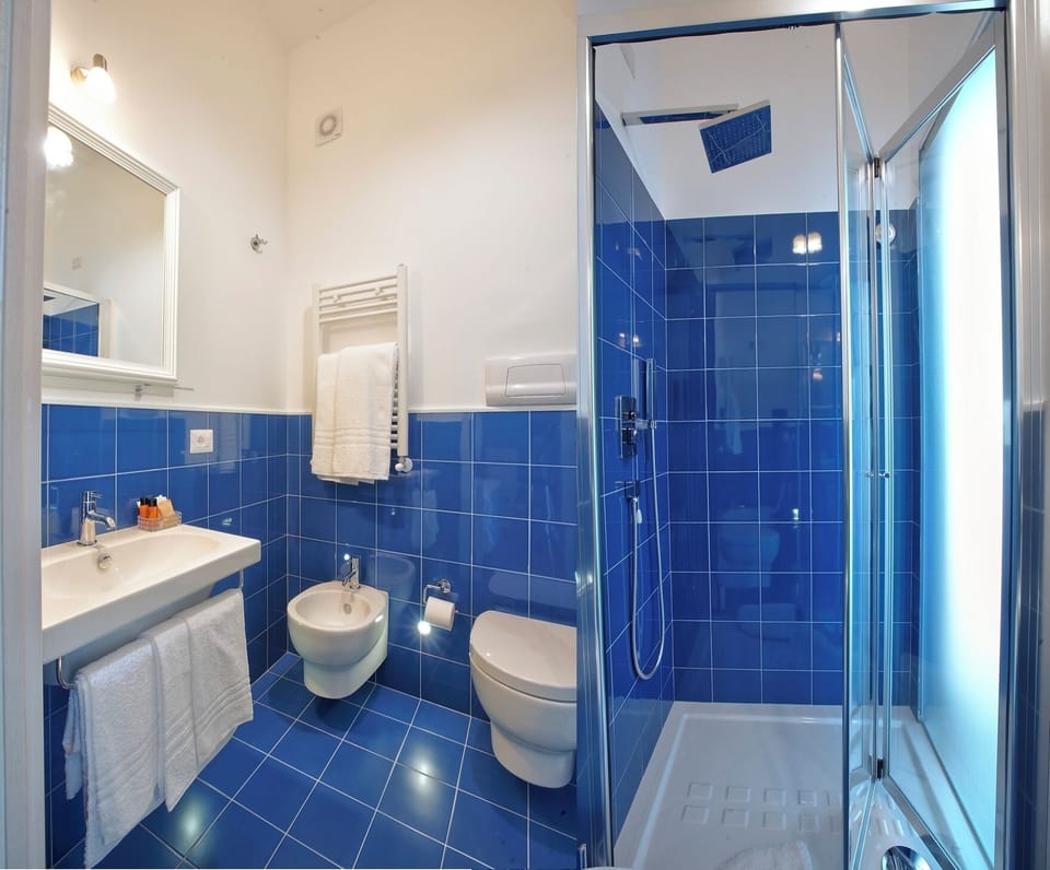 Deluxe Double Room, Balcony, City View | Bathroom | Slippers, bidet