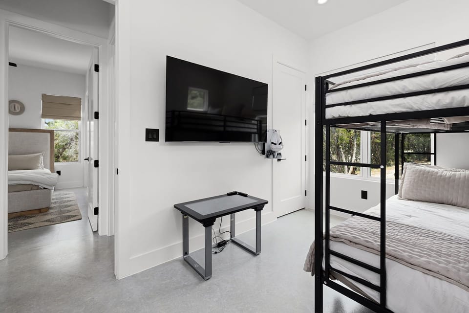 Stylish bunk room with comfortable queen beds.