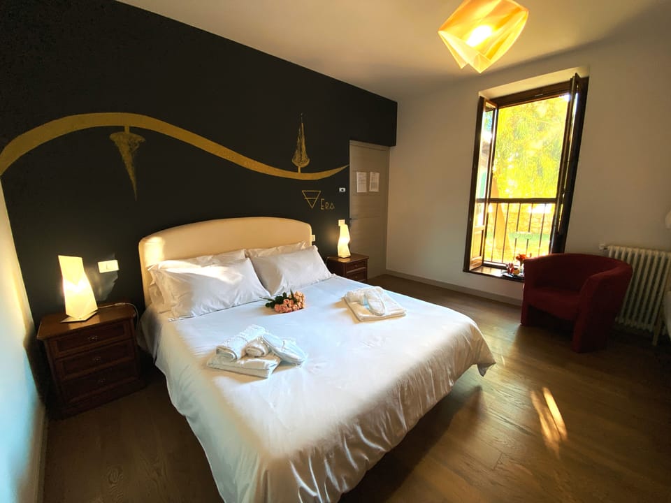 Quadruple Room, Pool View | Bed sheets