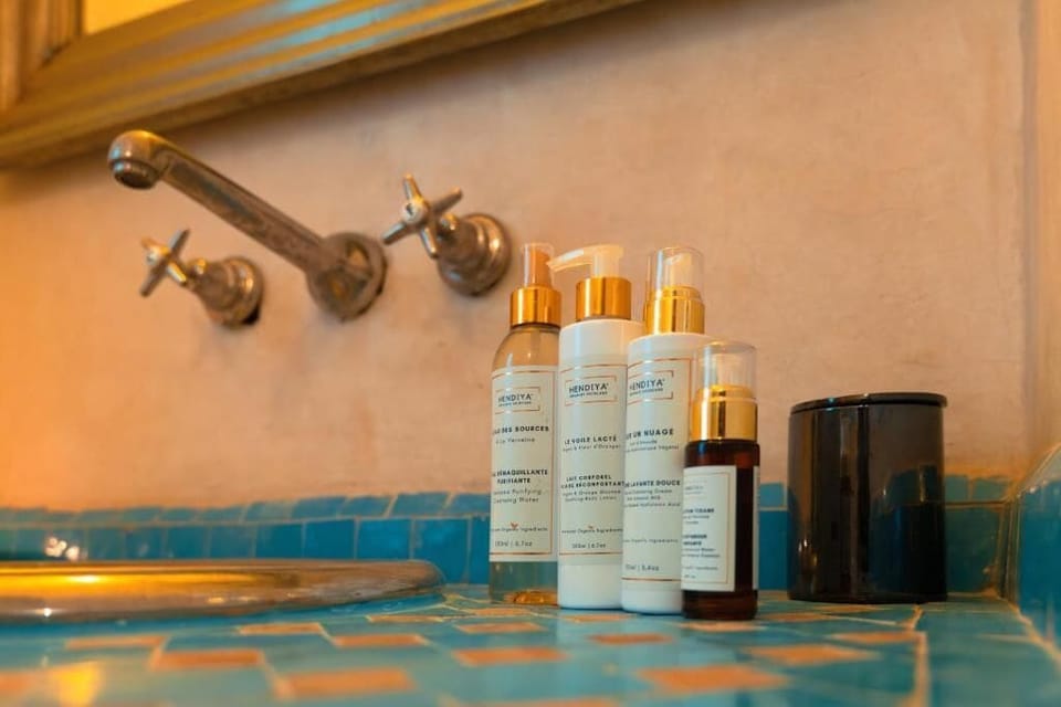 Junior Suite, 1 Queen Bed | Bathroom | Shower, rainfall showerhead, bathrobes, slippers