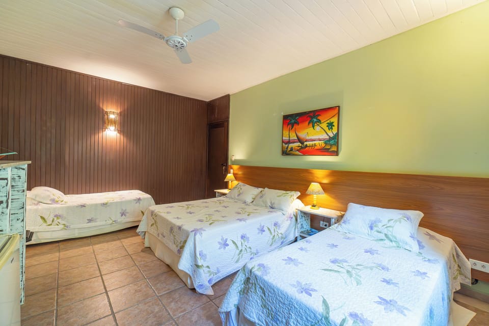 Family Quadruple Room, Garden View | Laptop workspace, free WiFi