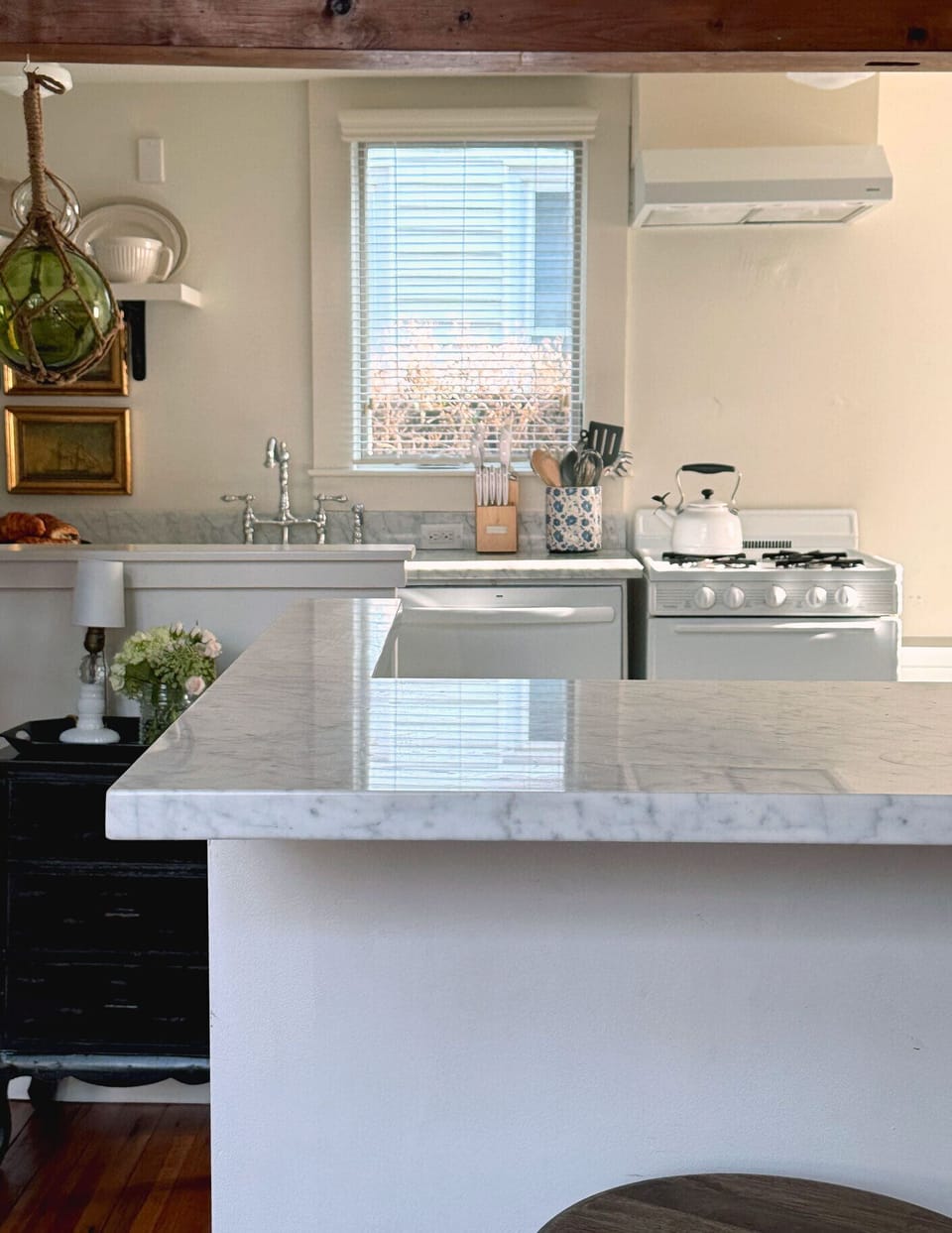 The open kitchen is well stocked and perfect for entertaining