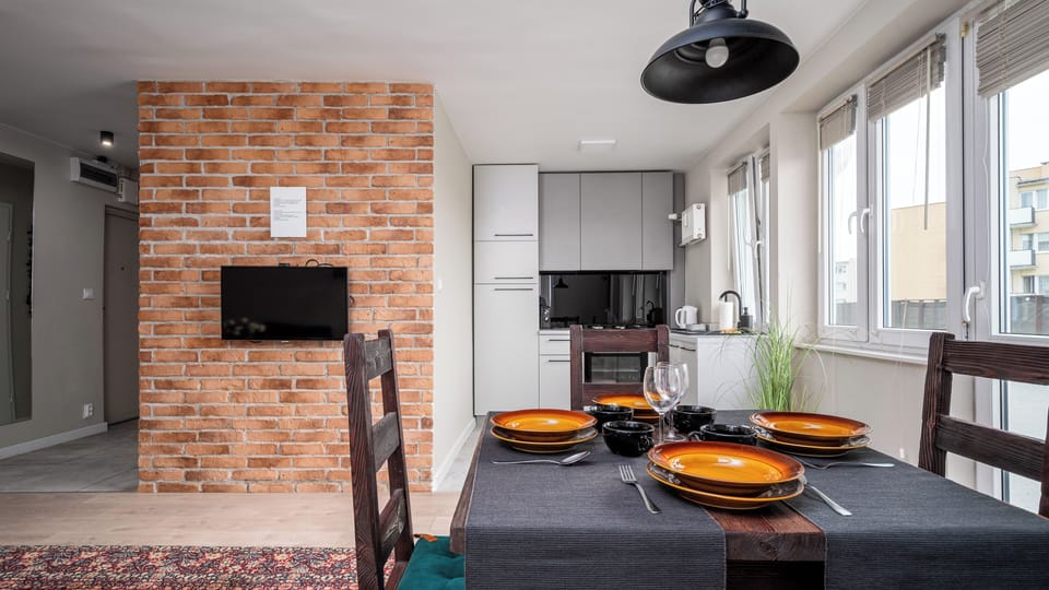 Apartment, Balcony, City View (94) | Living area | Flat-screen TV