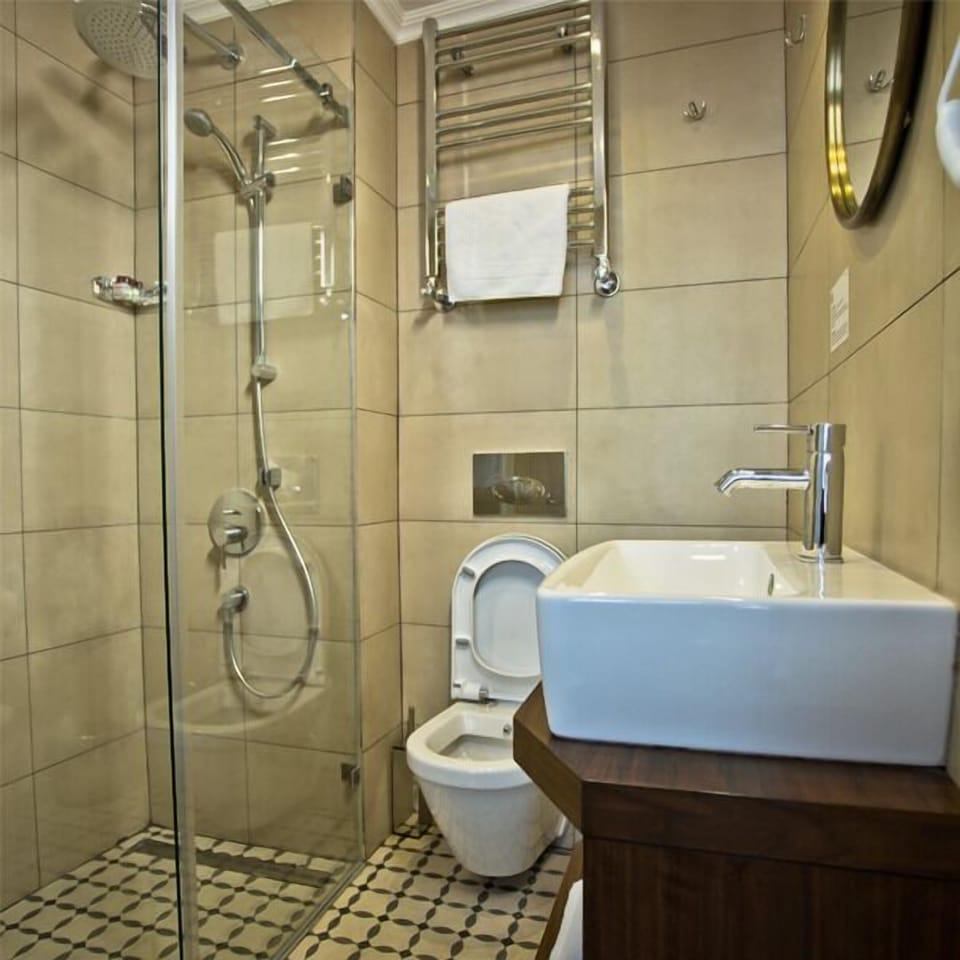 Shower, free toiletries, hair dryer, slippers