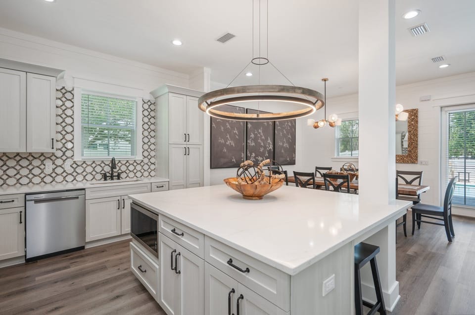 Open layout kitchen allows everyone to join in on the conversation while cooking