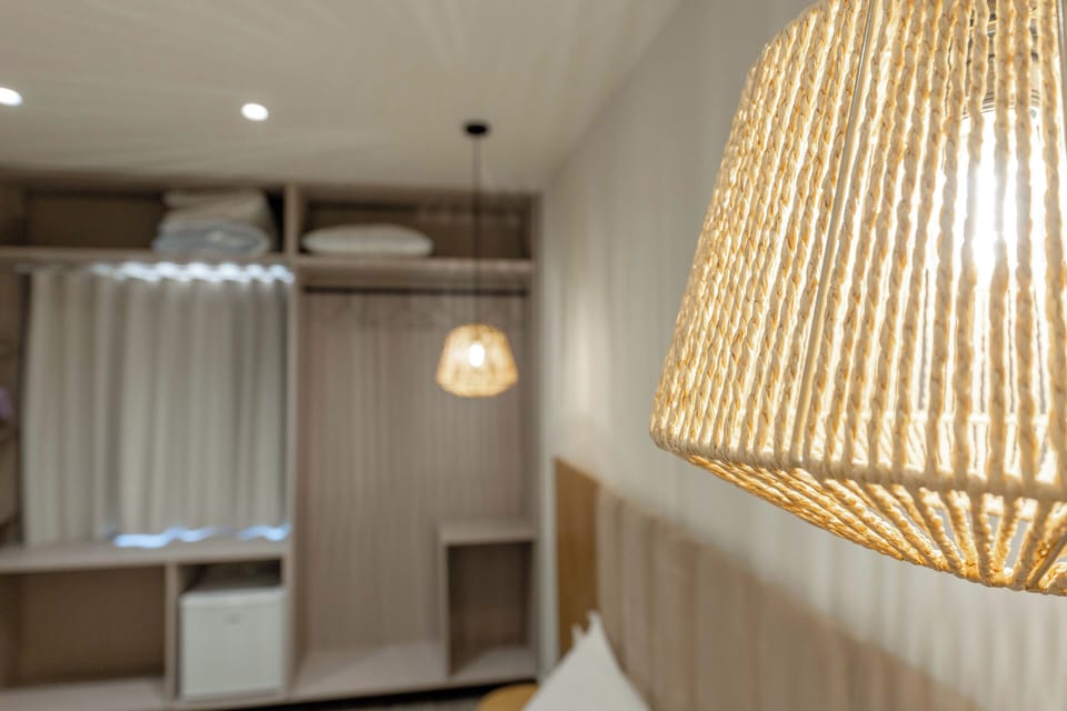 Deluxe Triple Room | Soundproofing, iron/ironing board, free WiFi, bed sheets