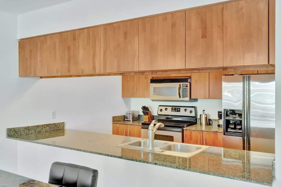 Modern kitchen equipped with all the essentials - cook, dine, and feel right at home.