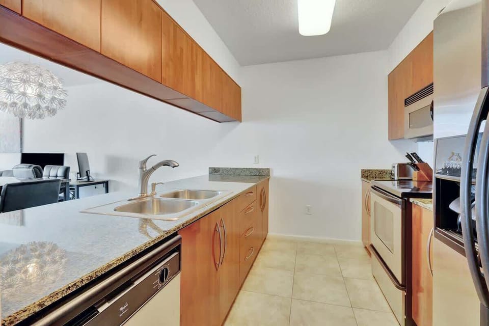 Modern kitchen equipped with all the essentials - cook, dine, and feel right at home.