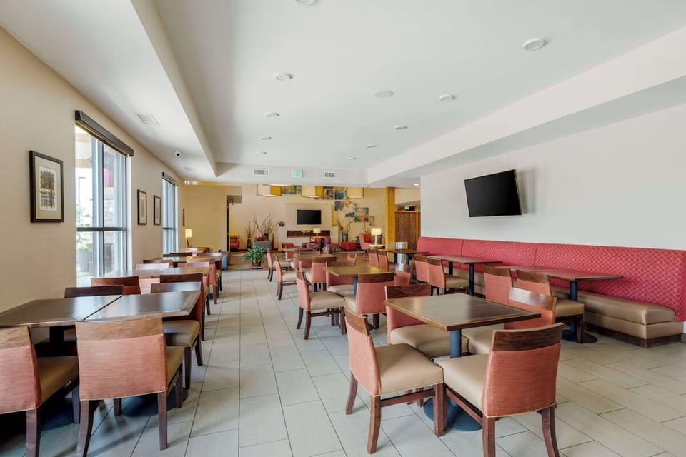 Enjoy a relaxed breakfast in the spacious, sunlit dining area.