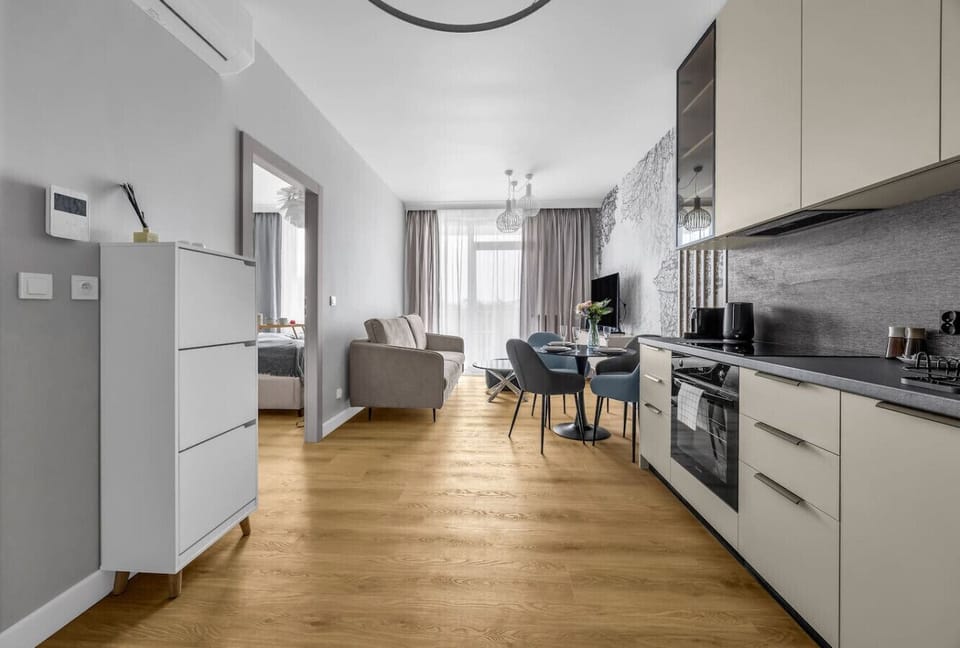 Living Room with Sofa Bed, Smart TV and Dining Table | Book Now with RENTUJEMY.COM