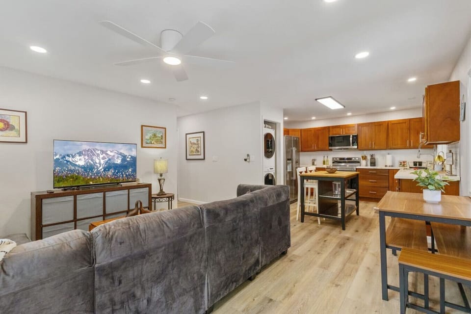 Open-concept living and kitchen area is perfect for cooking while enjoying company.