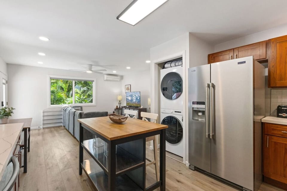 Sleek stainless-steel appliances and a central island that creates a perfect blend of style and functionality.