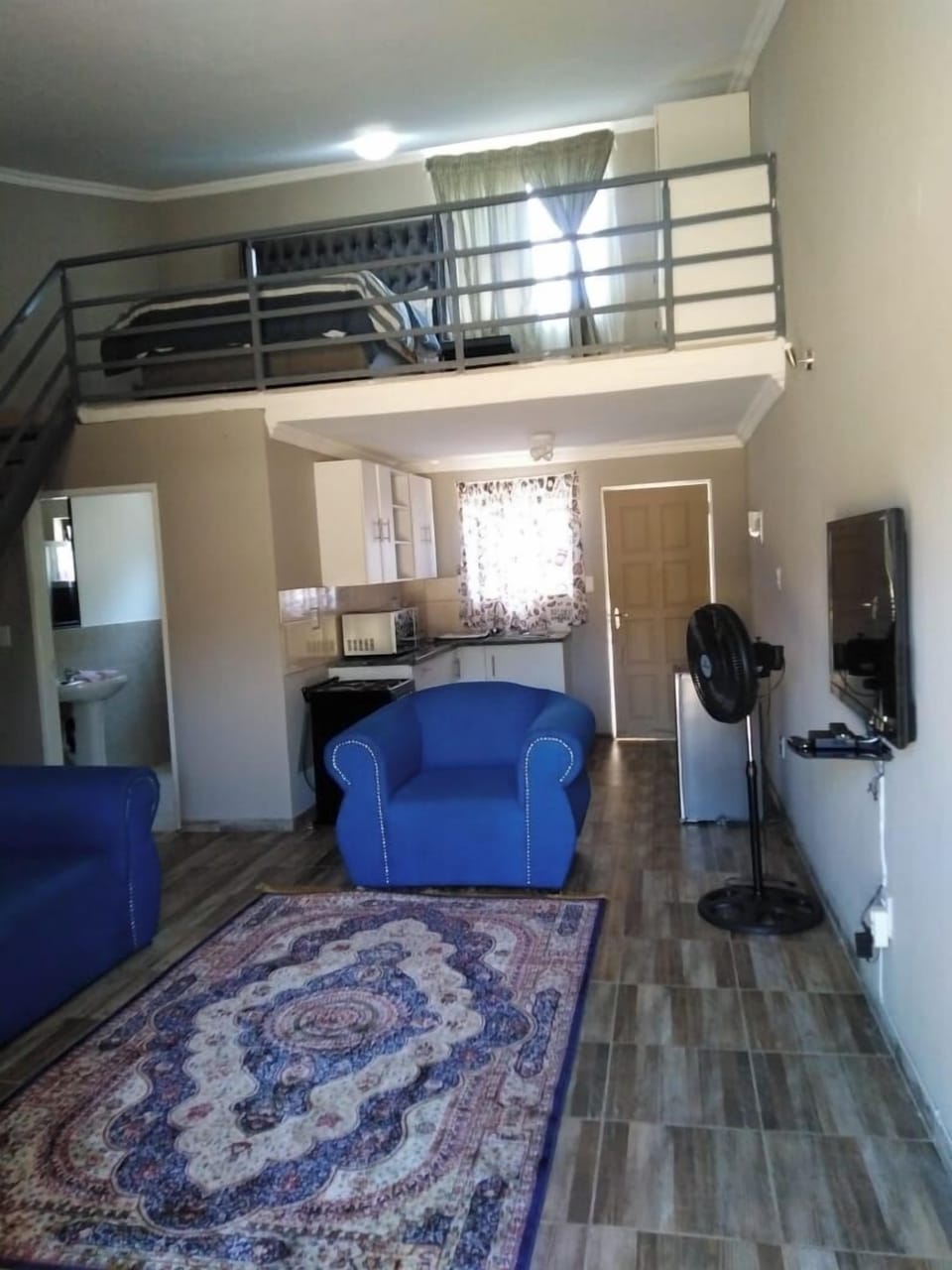 Comfort Apartment, Courtyard View | Living area | 32-inch plasma TV with satellite channels