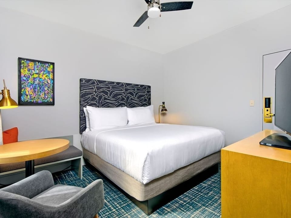 Unwind in crisp linens and modern comfort after exploring.