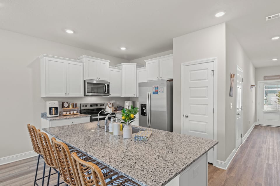 Whip up meals with ease in the fully equipped kitchen