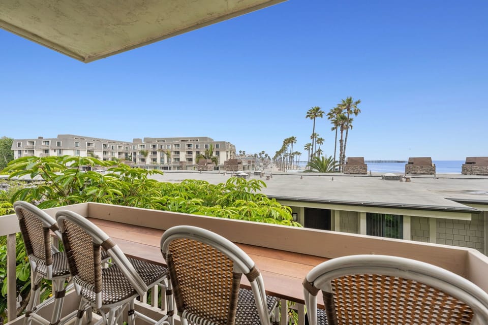 Savor your morning coffee or evening meal with stunning ocean views from the balcony.
