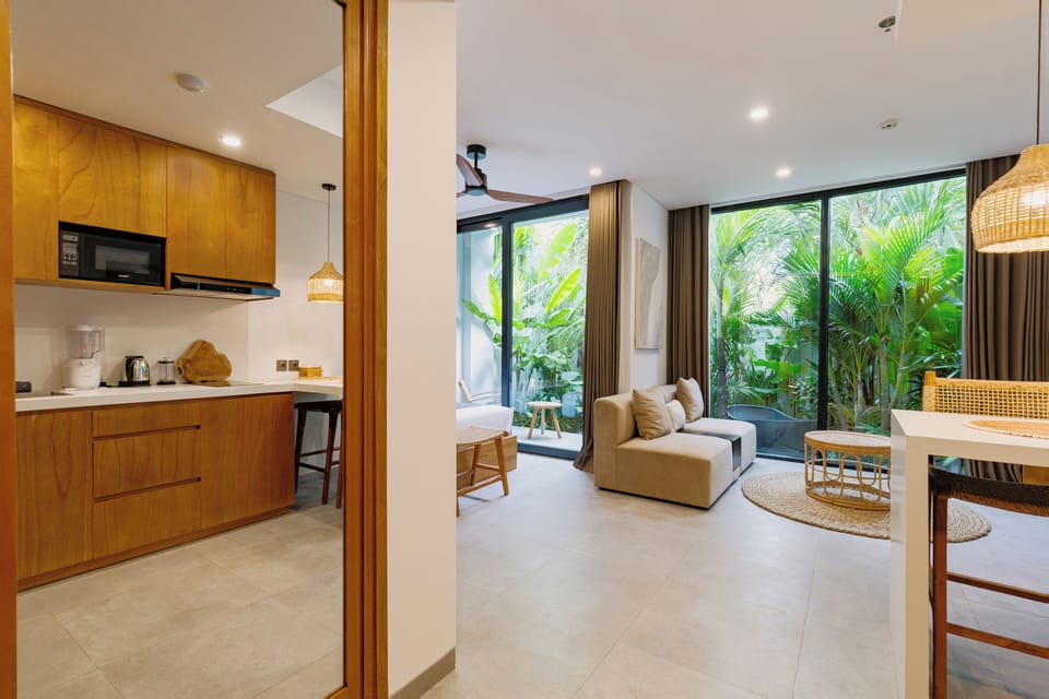 One Bedroom Suite with Garden | Living area | 50-inch Smart TV with satellite channels