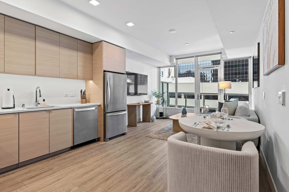 Kitchen, dining, and living space.