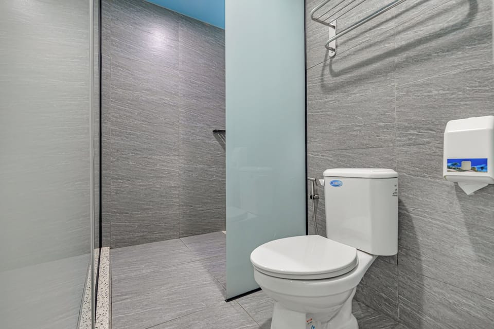 Superior Quadruple Room | Bathroom | Shower, hair dryer, slippers, towels