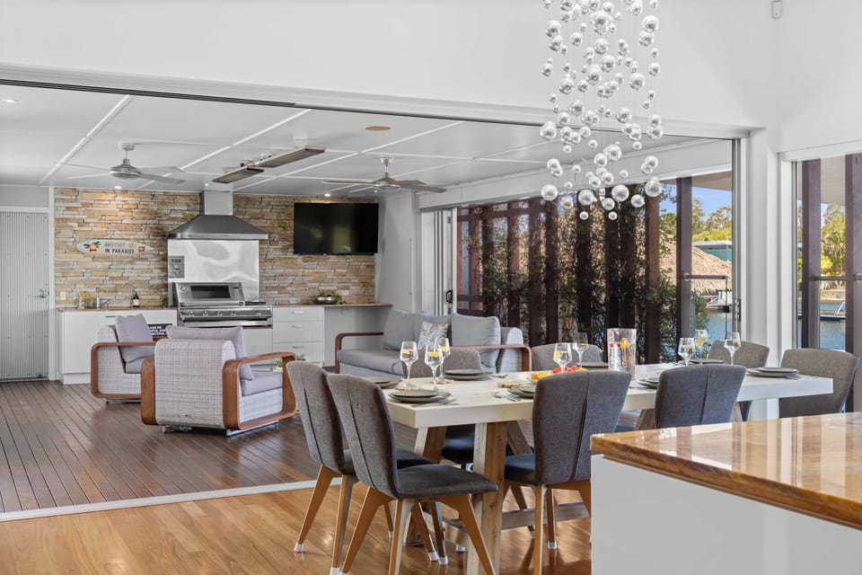 Dining area set within light filled living spaces.