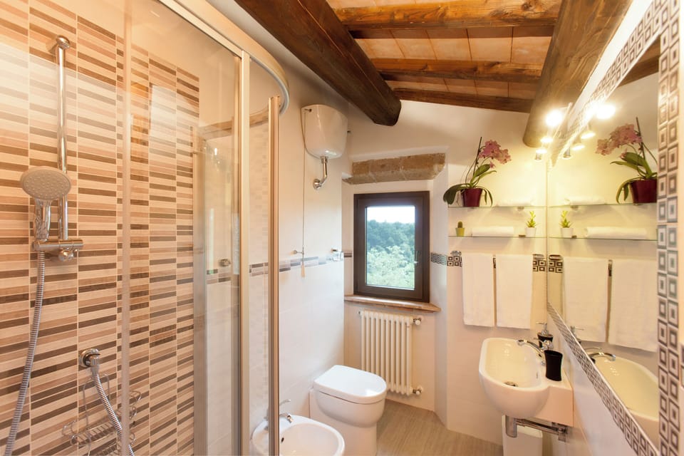Double Room, Garden View | Bathroom | Free toiletries, hair dryer, bidet, towels