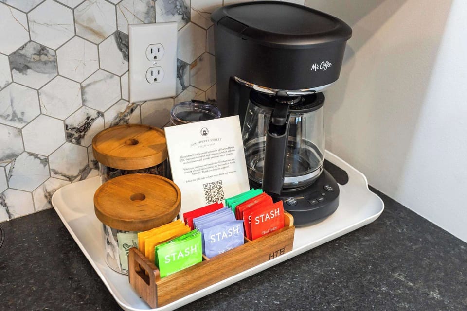Coffee/Tea Station with first round of beans, creamer and sweetener