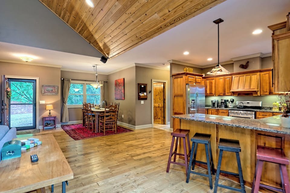 Entrance to the home. Kitchen and dining area.