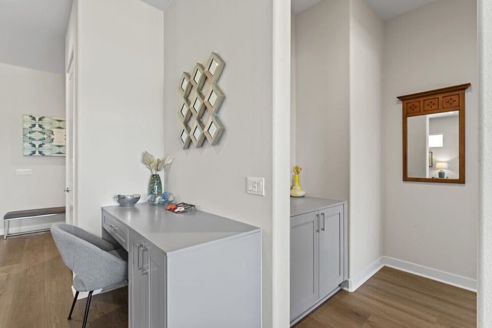 Built-in desk nook w/ sleek cabinetry for easy remote work