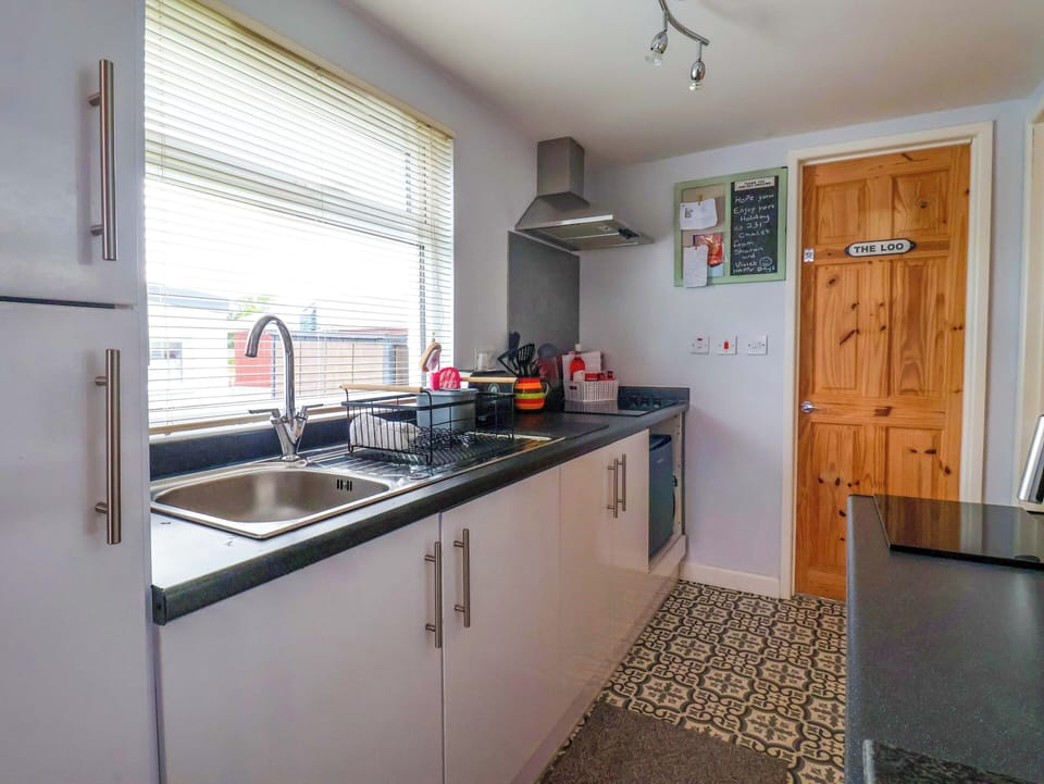 Fridge, microwave, cookware/dishes/utensils