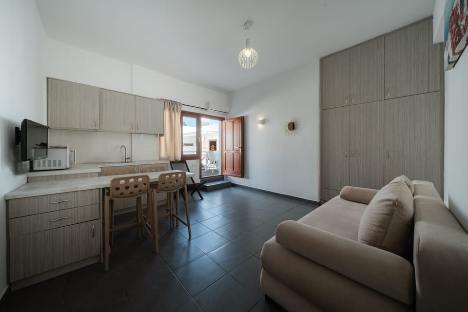 Junior Suite (Andromeda) | Living area | 24-inch LED TV with satellite channels, TV