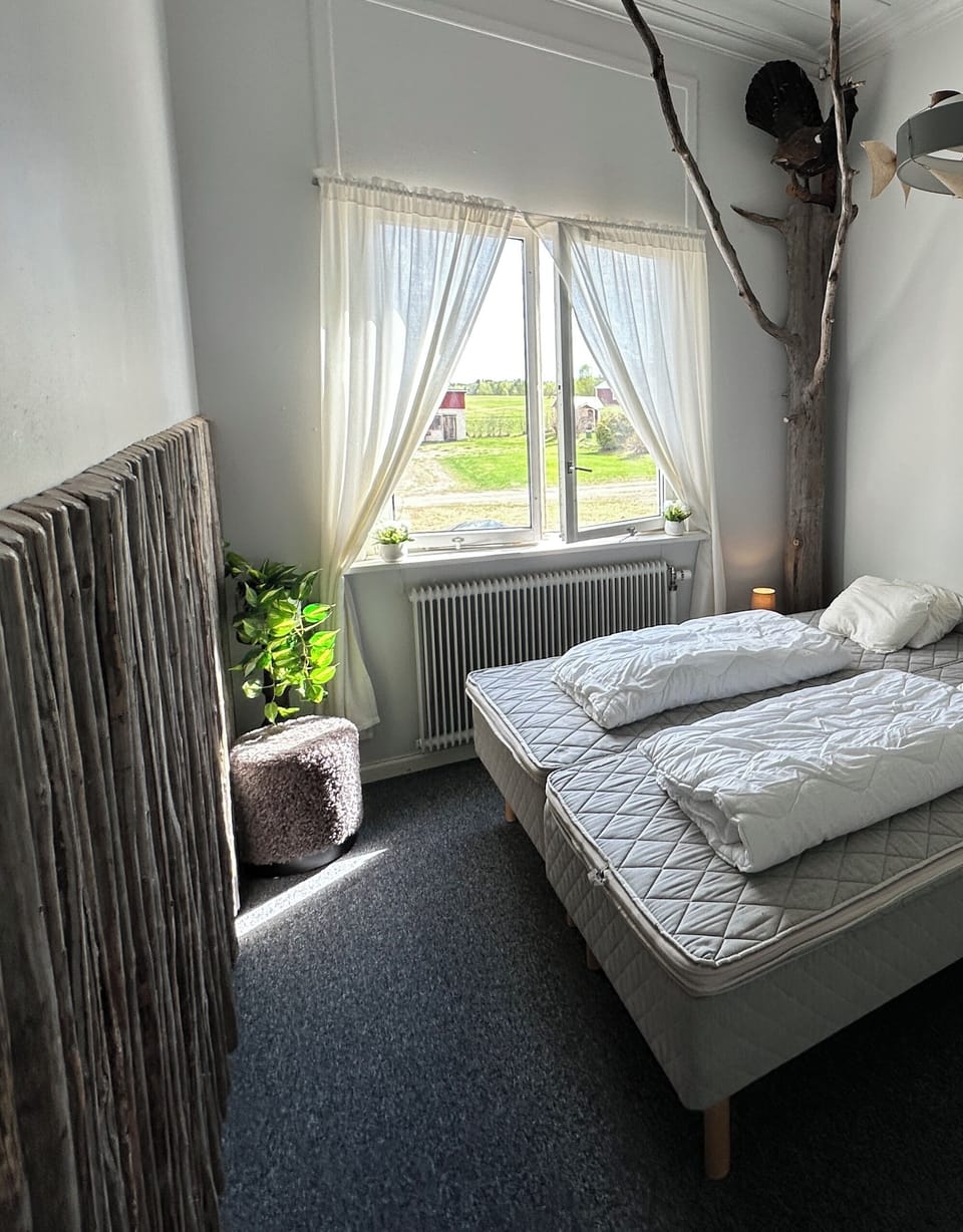 Superior Quadruple Room, Garden View | Laptop workspace, WiFi (free), bed sheets