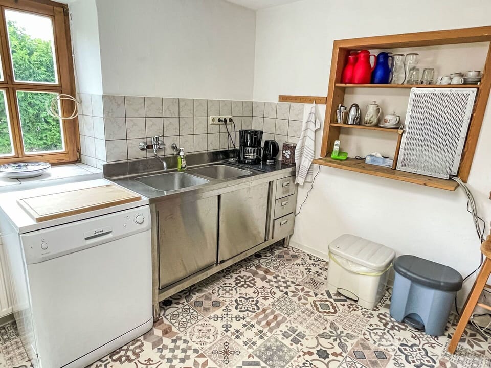 Flooring, Wood, Kitchen, Floor, Interior Design, Kitchen Appliance, Countertop, Kitchen Sink, Furniture, Room