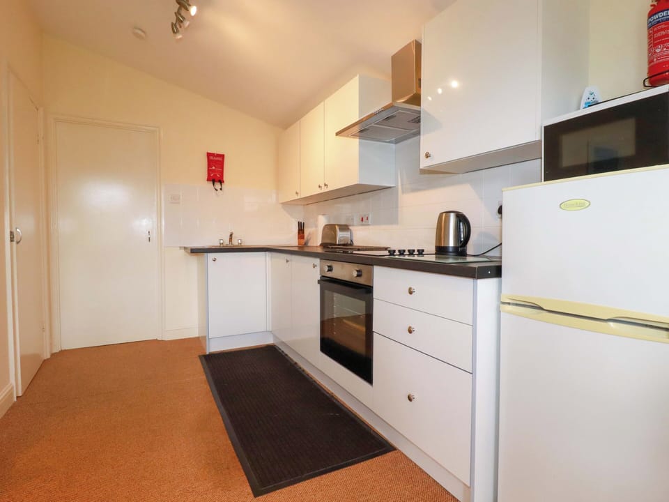 Fridge, microwave, toaster, cookware/dishes/utensils
