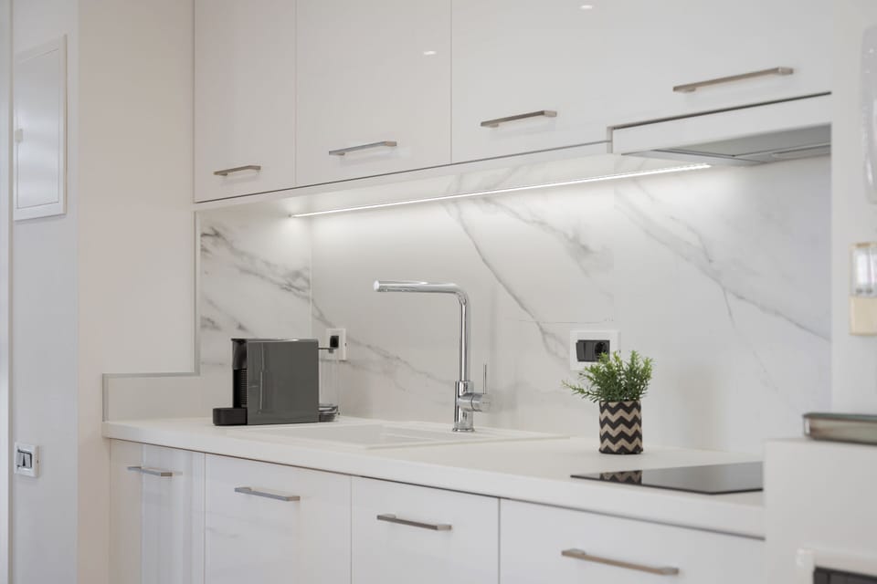 Deluxe Apartment, Sea View | Private kitchen | Full-size fridge, microwave, oven, stovetop