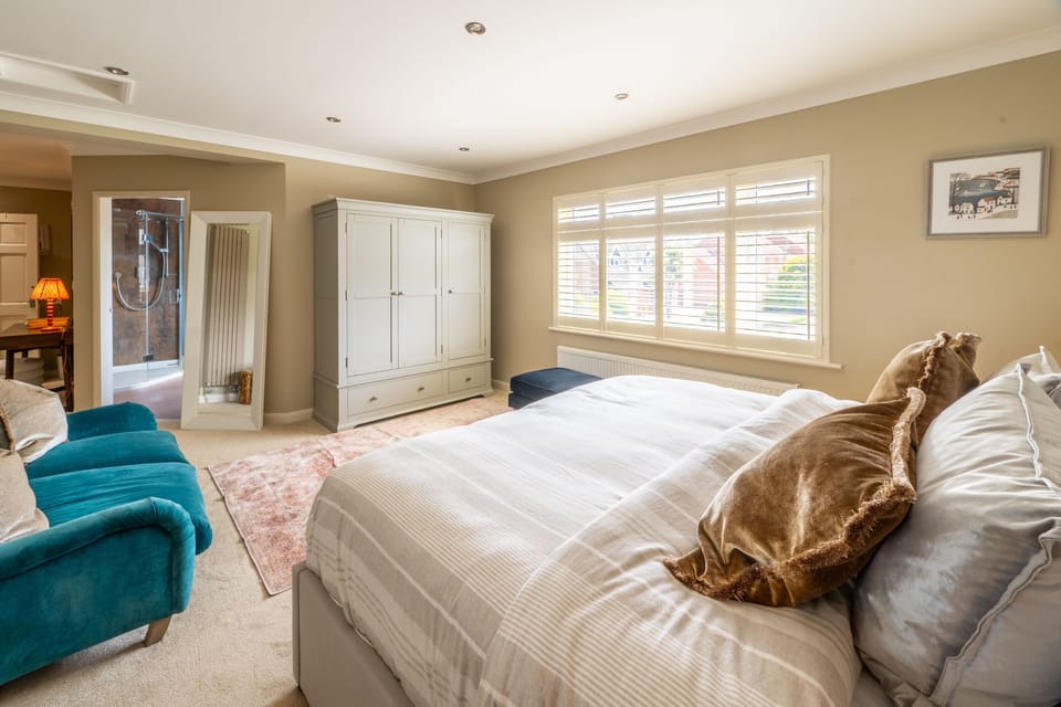 First floor: Master bedroom with  6' super-king size bed and dressing room