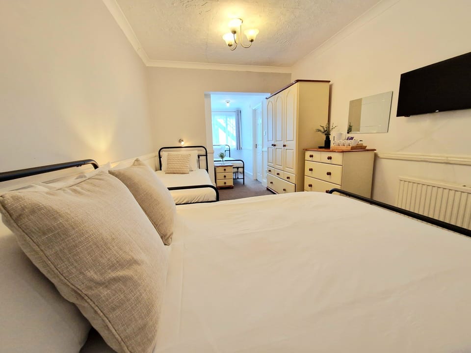 Family Room | Premium bedding, individually decorated, individually furnished