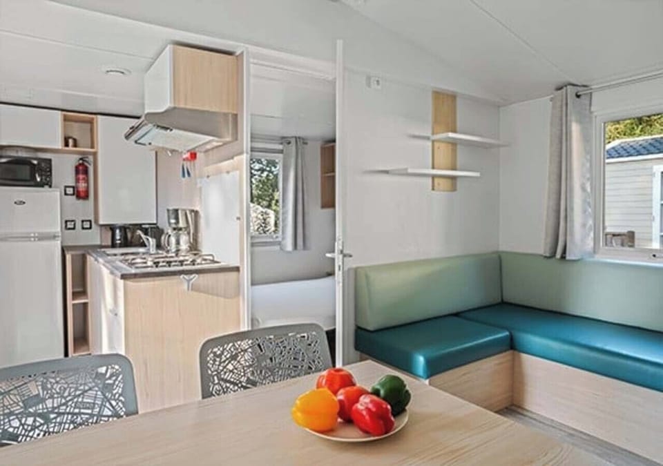 Comfort Mobile Home | Living area | 19-inch flat-screen TV with cable channels