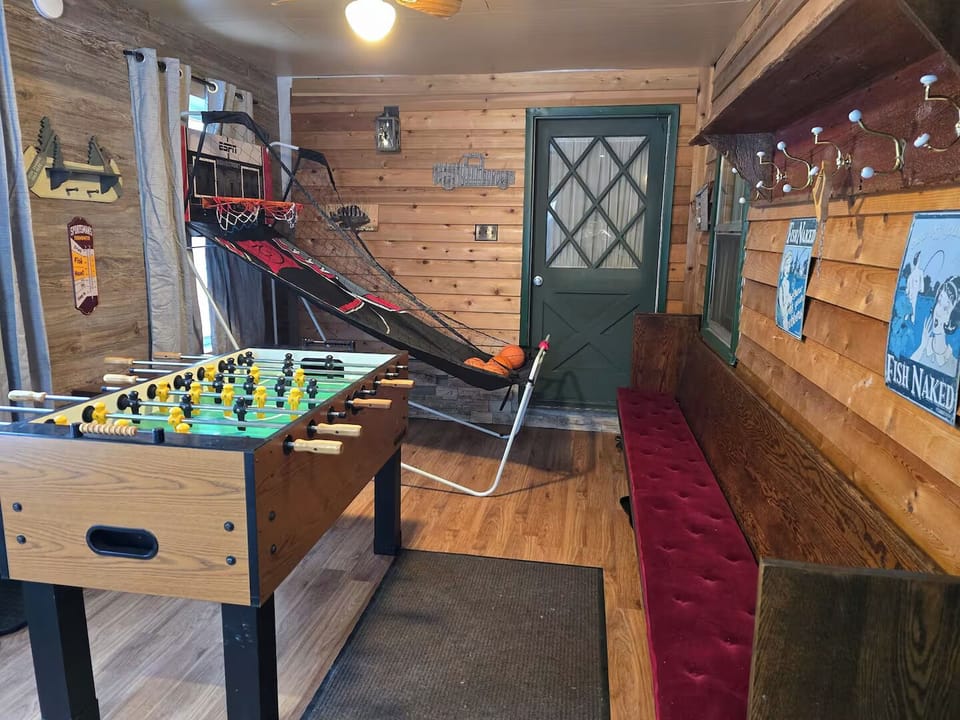 Fun times to be had in our entryway porch area. Play foosball and basketball.