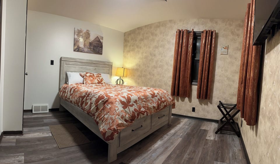 Downstairs bedroom located off the living room area