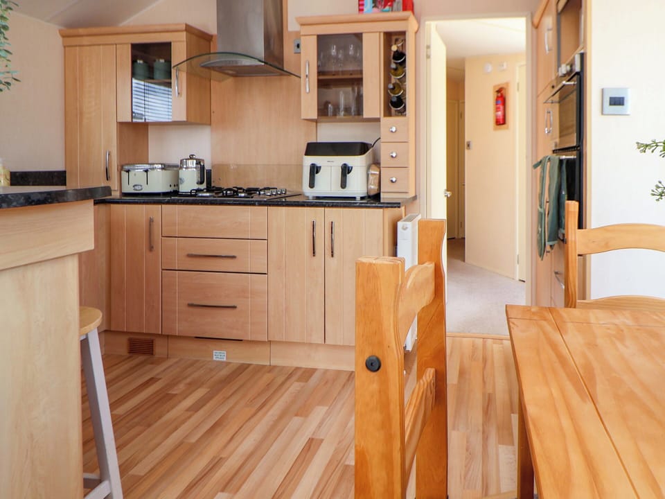 Fridge, microwave, toaster, cookware/dishes/utensils