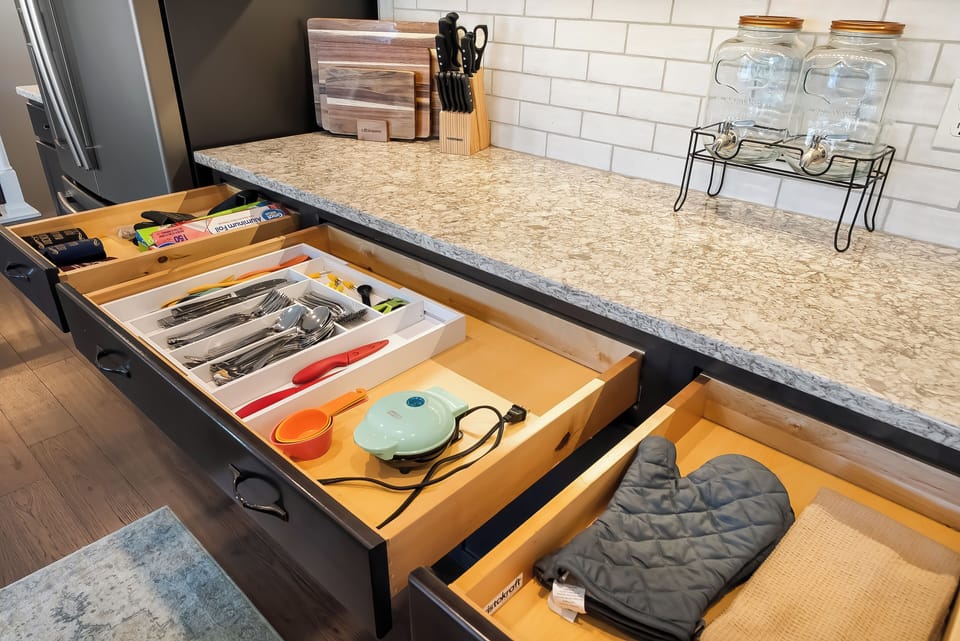 Your fully equipped kitchen features organized drawers with all the utensils, cookware, and tools you need for comfortable meal preparation.