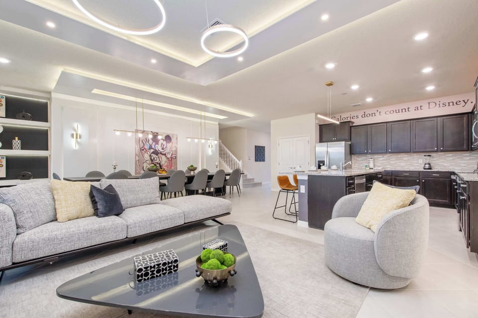 Relax by your private screened-in pool and spa, set on a lush and spacious lawn.