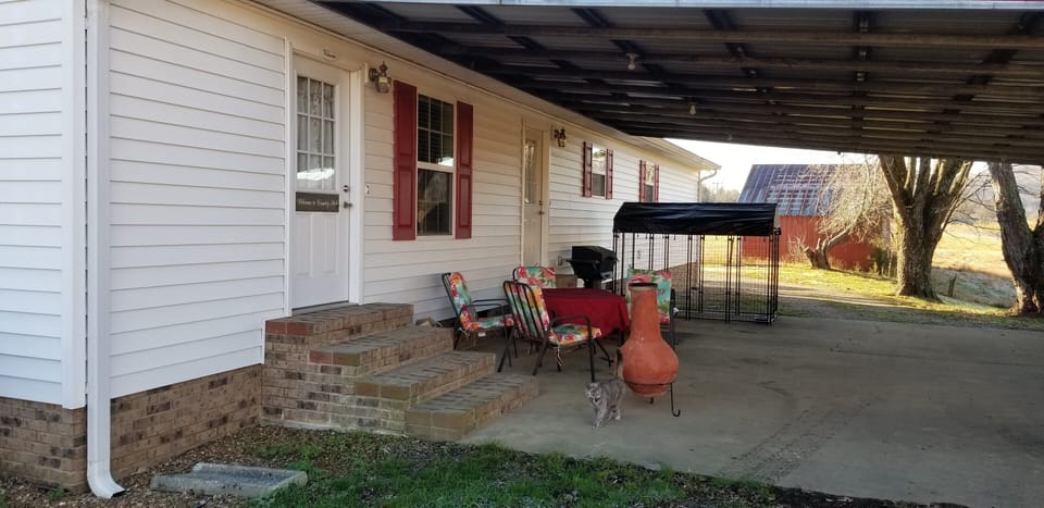 Back of house, 1st door is entrance,  code lock