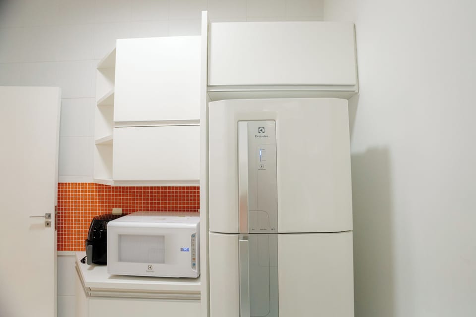 Apartment | Private kitchen | Fridge, microwave, stovetop, cookware/dishes/utensils