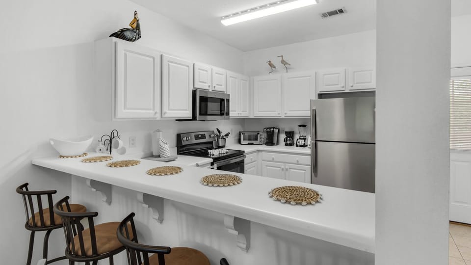 Condo, Multiple Beds, Balcony, Garden View (Heron's Watch 6207) | Private kitchen | Fridge, microwave, oven, stovetop