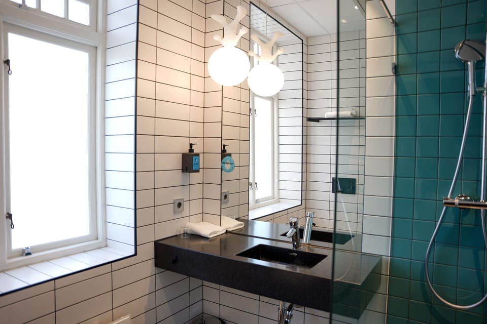 Room (Compact Single) | Bathroom | Shower, hair dryer, towels