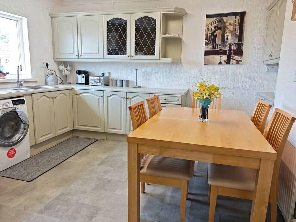 Airy kitchen diner with seating for shared family meals