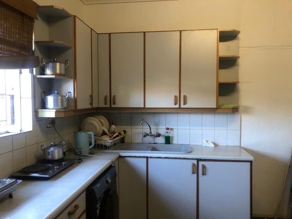 Comfort Room, Balcony, Garden View | Shared kitchen facilities