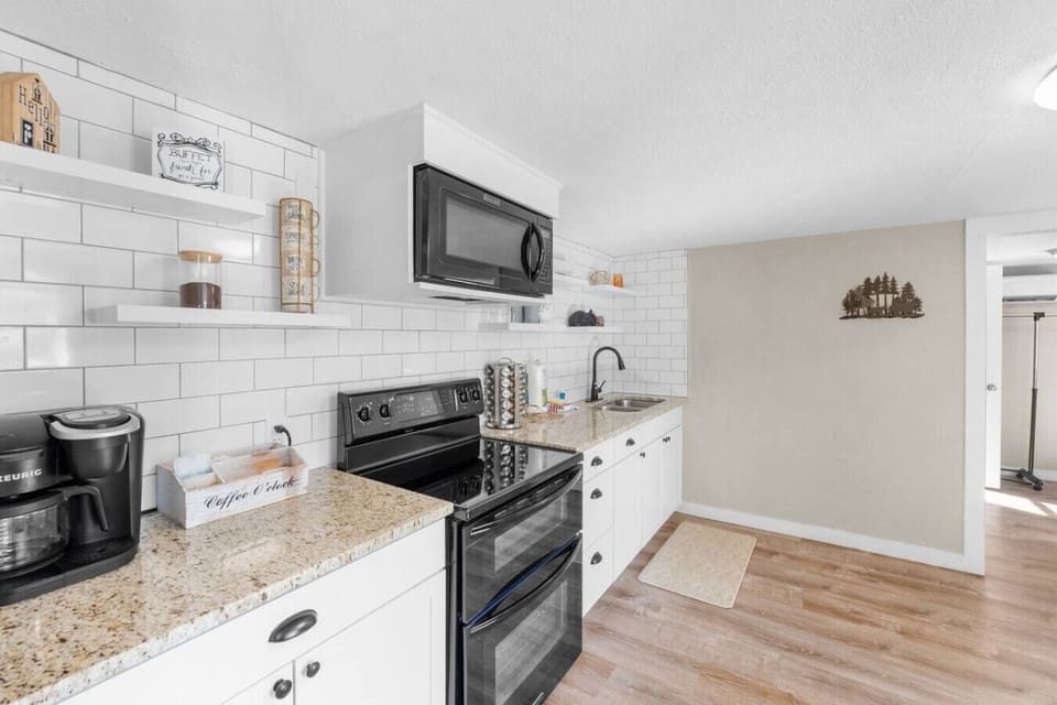 The kitchen is fully equipped with everything you need to make meals in or enjoy takeout from a wonderful local restaurant.