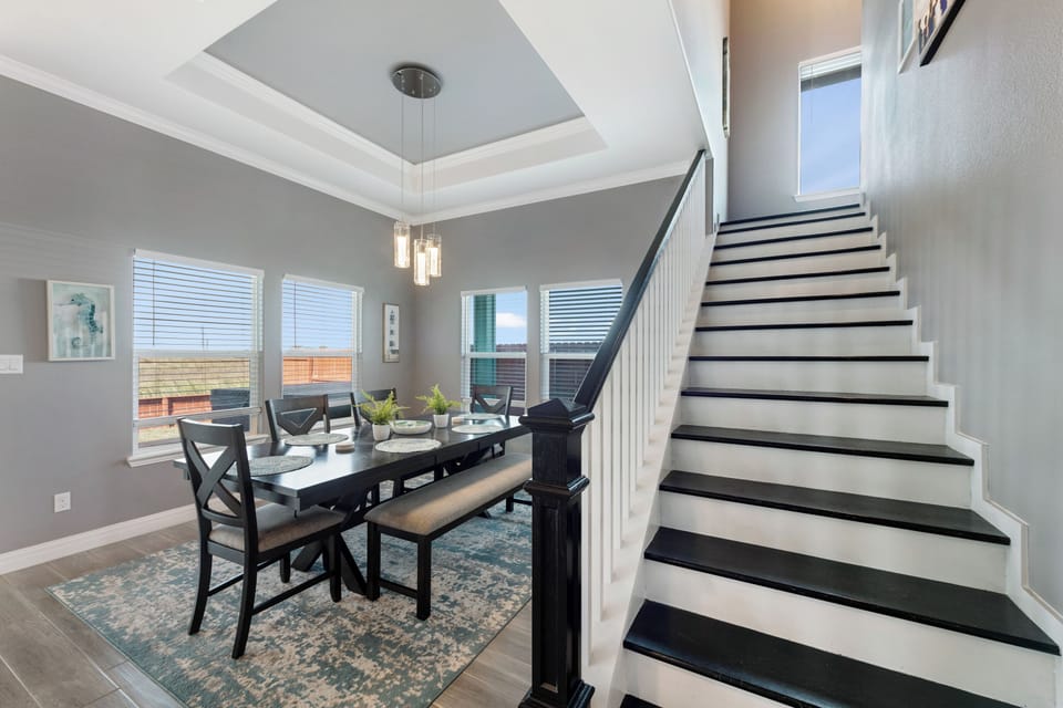 The stairs lead to the second floor bedrooms.